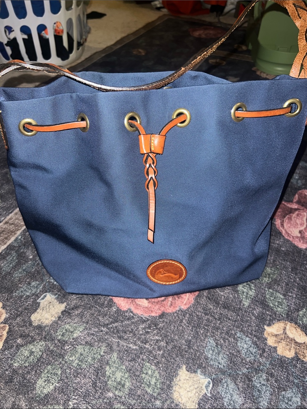 Dooney & Bourke nylon & drawstring navy bag.